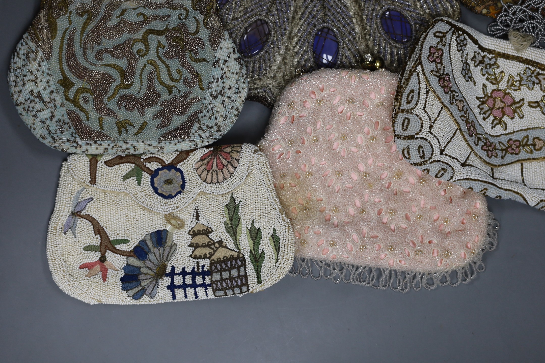 Nine mixed late 19th century to mid 20th century multicoloured bead worked and embroidered evening bags